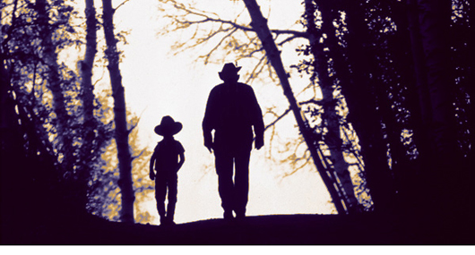 Photo of Cowboy and his son